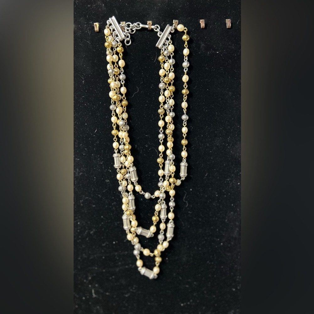 Elegant Gold and Silver Multi-Strand Necklace